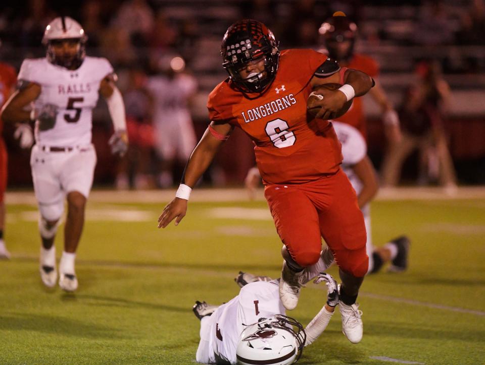 Lockney's Xavier Jimenez runs with the ball against Ralls in a District 3-2A Division II high school football game, Friday, Oct. 20, 2023, at Mitchell Zimmerman Field in Lockney.