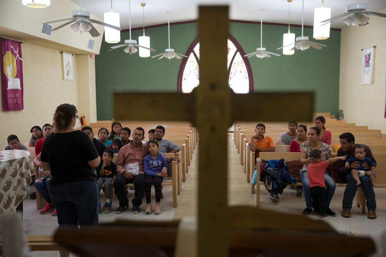 Migrants are welcomed to a Methodist church in New Mexico after being released by U.S. Immigration and Customs Enforcement in 2019. <a href="https://www.gettyimages.com/detail/news-photo/migrants-mostly-from-honduras-el-salvador-guatemala-and-news-photo/1153579677?adppopup=true" rel="nofollow noopener" target="_blank" data-ylk="slk:Joe Raedle/Getty Images;elm:context_link;itc:0;sec:content-canvas" class="link ">Joe Raedle/Getty Images</a>