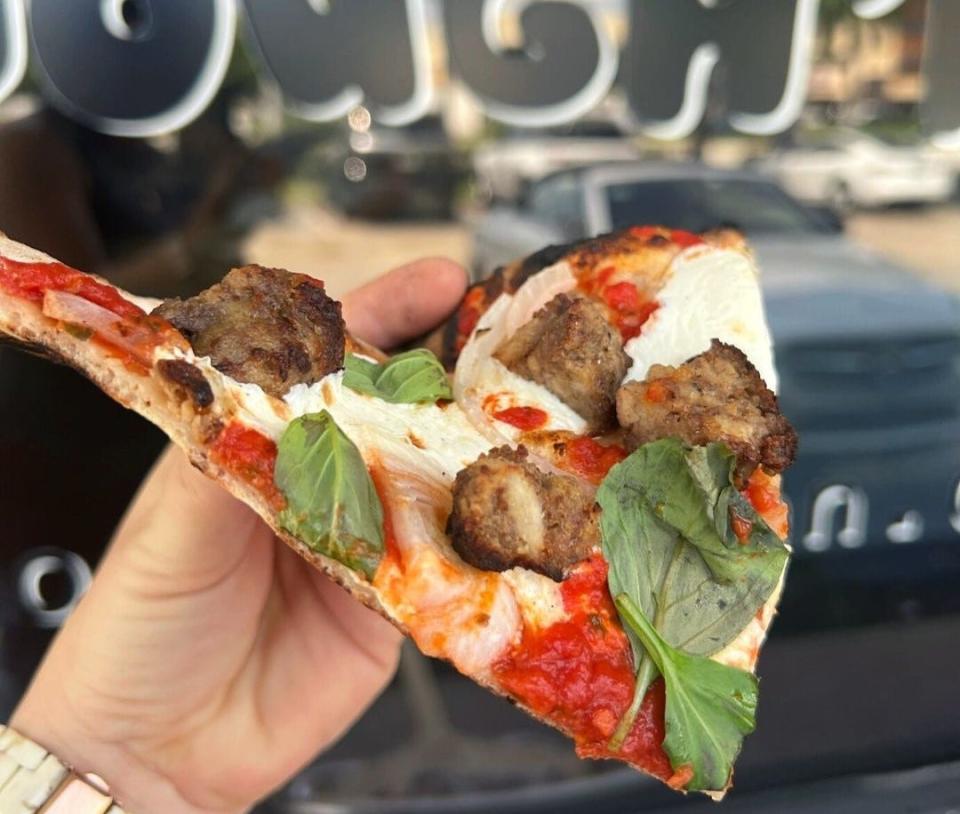 A meatball pizza special at How Ya Dough'n pizzeria in Boca Raton.