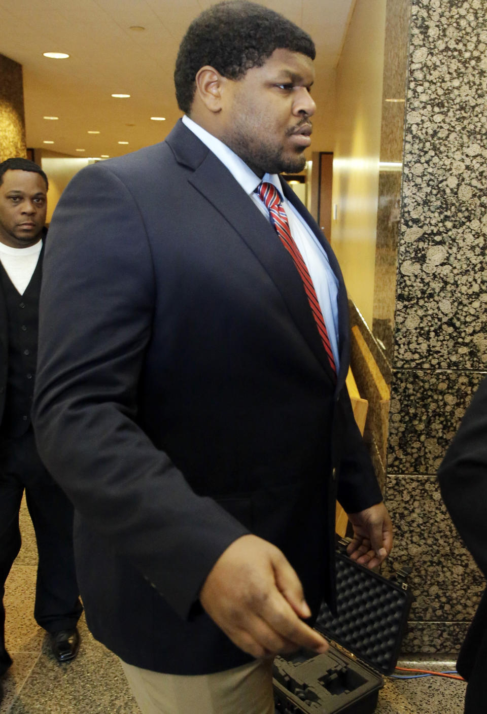 Former Dallas Cowboys NFL football player Josh Brent arrives at court for closing arguments in his intoxication manslaughter trial Tuesday, Jan. 21, 2014, in Waco, Texas. Lawyers wrapped up their closing arguments Tuesday morning before the case went to the jury for deliberations. Prosecutors accuse the former defensive tackle of drunkenly crashing his Mercedes near Dallas during a night out in December 2012, killing his good friend and teammate, Jerry Brown. (AP Photo/LM Otero)