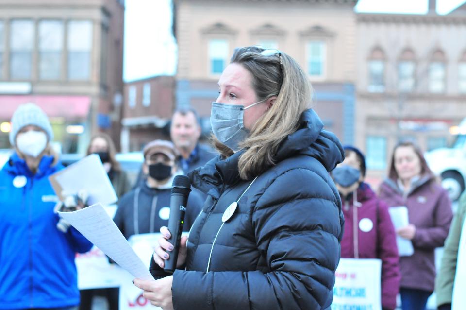 Jenn Roderiques, a registered nurse who has worked at Morton for 21 years, speaks at a Massachusetts Nurses Association rally for Morton Hospital nurses on Thursday, Jan. 13, 2022 on Taunton Green.