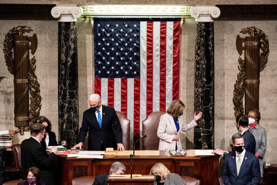 washington, dc january 06 vice president mike pence and speaker of the house nancy pelosi d ca preside over a joint session of congress on january 6, 2021 in washington, dc congress has reconvened to ratify president elect joe biden's 306 232 electoral college win over president donald trump, hours after a pro trump mob broke into the us capitol and disrupted proceedings photo by erin schaff poolgetty images