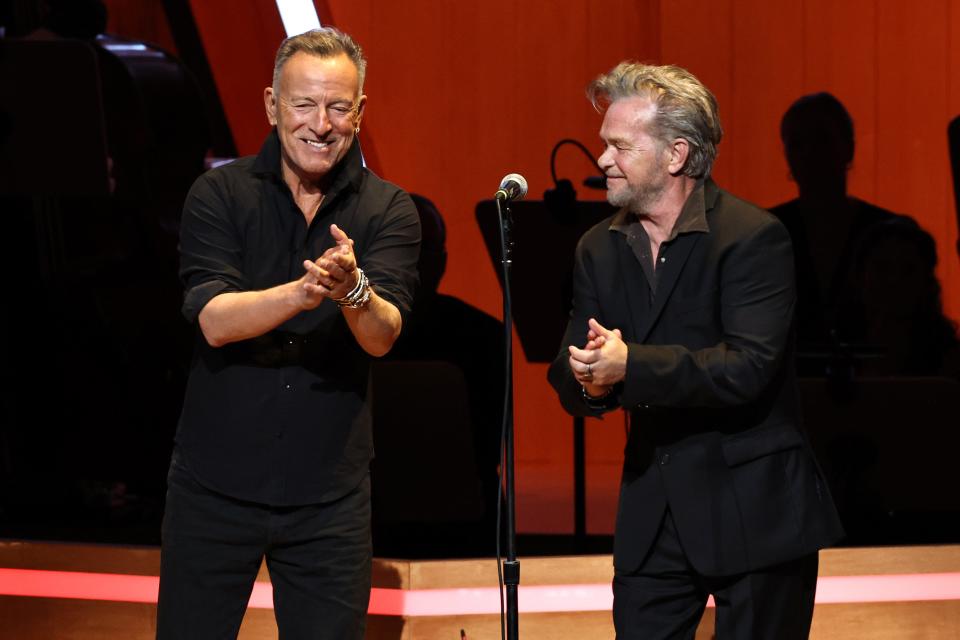 Bruce Springsteen and John Mellencamp perform Nov. 6 during the 17th annual Stand Up For Heroes Benefit presented by Bob Woodruff Foundation and NY Comedy Festival at Lincoln Center's David Geffen Hall in New York.