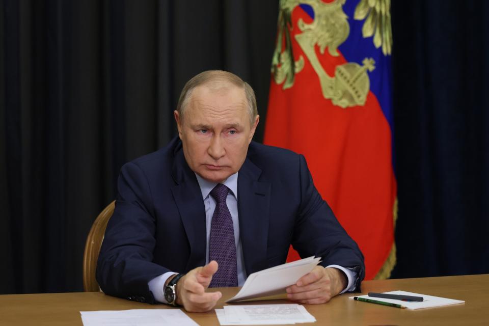 Russian President Vladimir Putin gestures as he attends a meeting on agricultural issues via videoconference in the Bocharov Ruchei residence in the Black Sea resort of Sochi, Russia, Tuesday, Sept. 27, 2022. (Gavriil Grigorov, Sputnik, Kremlin Pool Photo via AP)