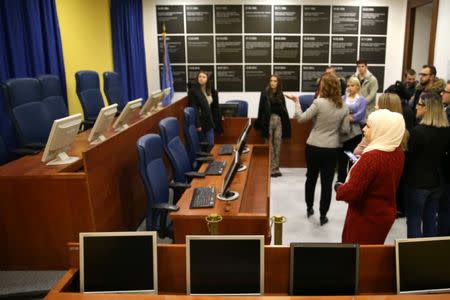 Students are seen at the original courtroom of the United Nations International Criminal Tribunal for the former Yugoslavia (ICTY), as a part of their education, in Sarajevo City Hall, Bosnia and Herzegovina December 7, 2018. Picture taken December 7, 2018. REUTERS/Dado Ruvic