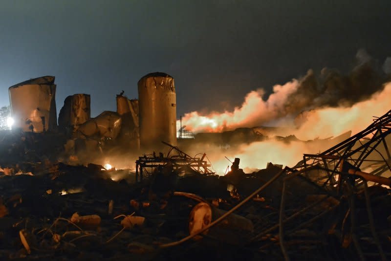 Remains of a fertilizer plant and other buildings smolder after the plant exploded in West, Texas on April 17, 2013. File Photo by Larry W. Smith/EPA