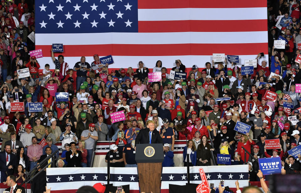 President Donald Trump speaks to a cheering crowd at Eastern Kentucky University, Saturday, Oct. 13, 2018, in Richmond, Ky. (AP Photo/Timothy D. Easley)