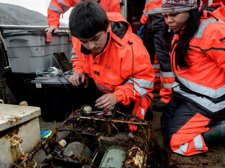 Marine biologists Maximiliano Vergara (left) and Jurleys Vellojin say the Seno Ballena fjord offers them an open-air laboratory to study climate change