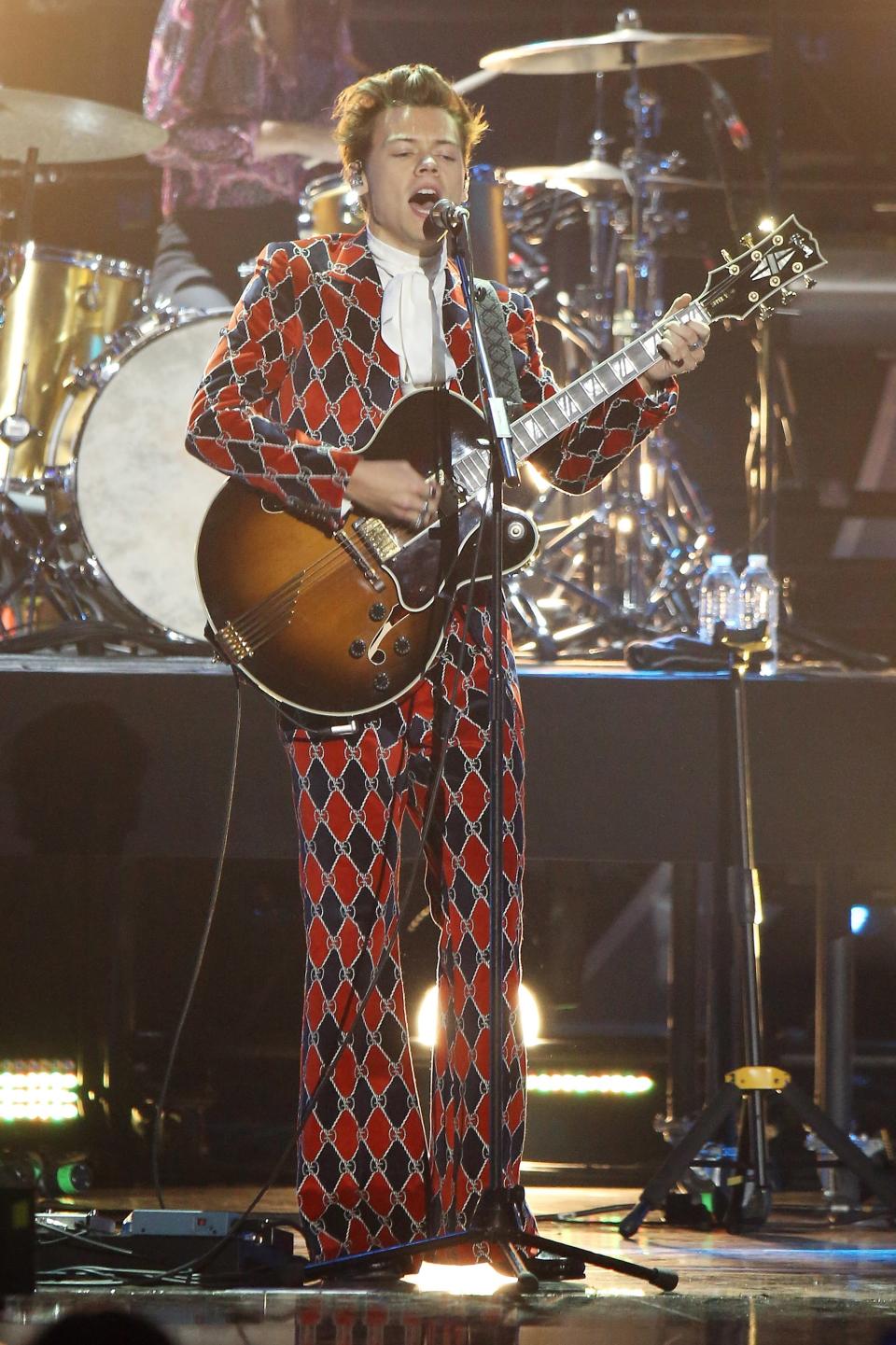 Printed suits? Check. Ruffled blouses? Double check. Harry Styles rules the red carpet in these campiest looks.