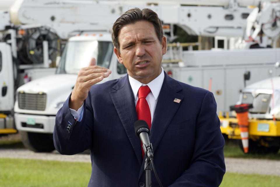 Florida Gov. Ron DeSantis gestures during a news conference in Tampa, Florida, on Wednesday. (Chris O'Meara/AP)