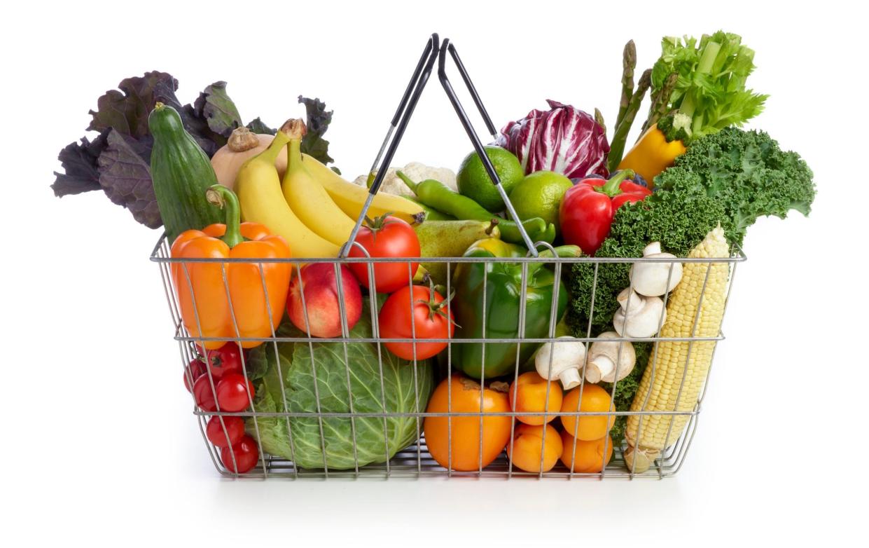 A shopping basket full of fruit and veg - Science Photo Library/ Getty