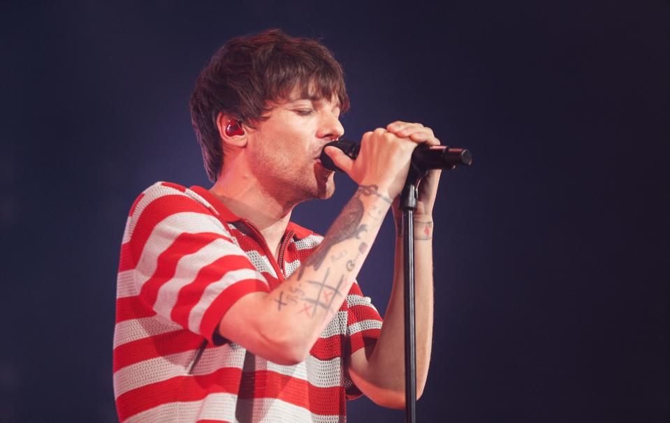 English singer and songwriter Louis Tomlinson performs during his World Tour 2022, in Bogota on June 3, 2022. (Photo by JUAN PABLO PINO / AFP) (Photo by JUAN PABLO PINO/AFP via Getty Images)