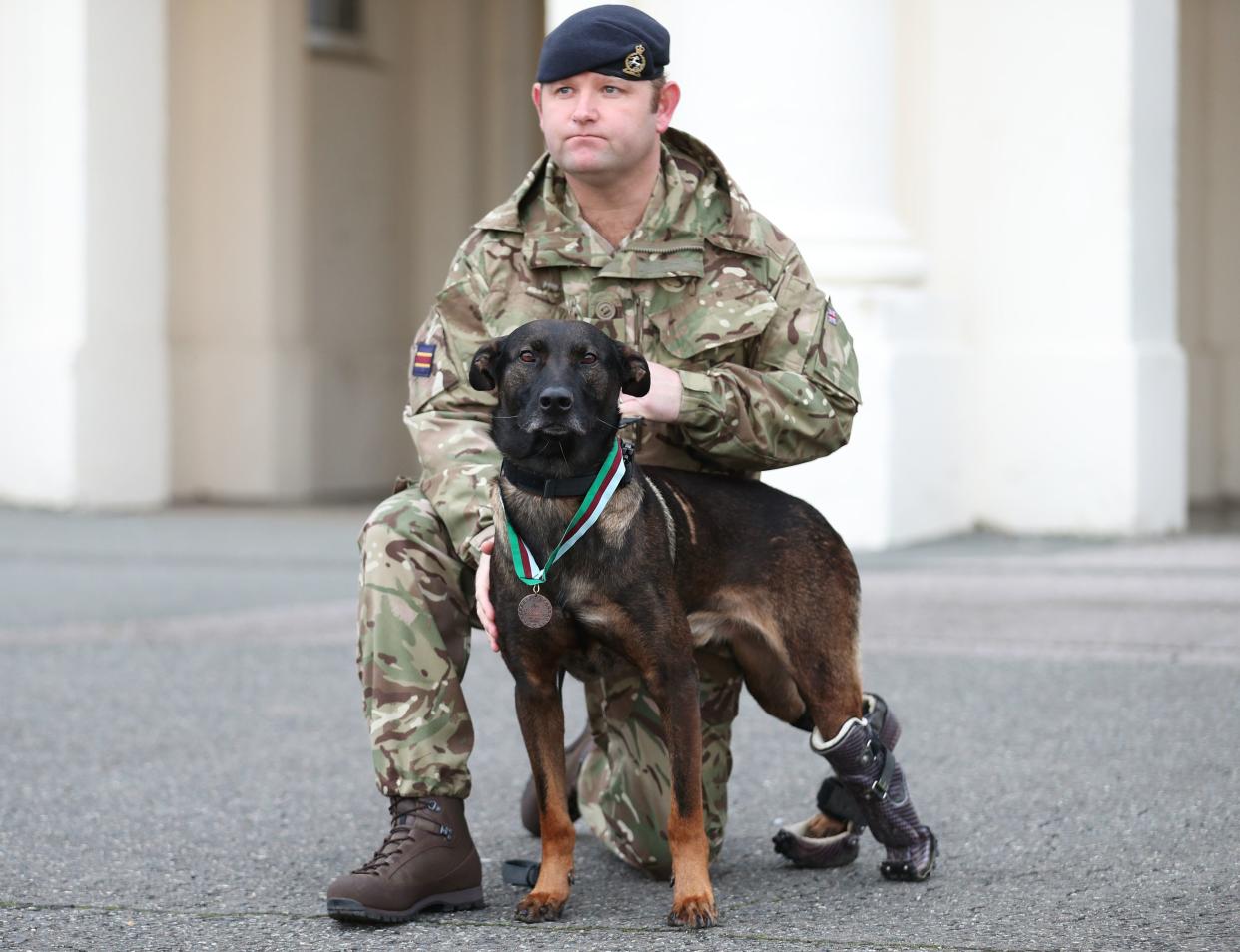 <p>Kuno suffered bullet wounds to his back legs during the siege, leaving him in need of several operations and eventually the amputation of part of one paw.</p> (PA)