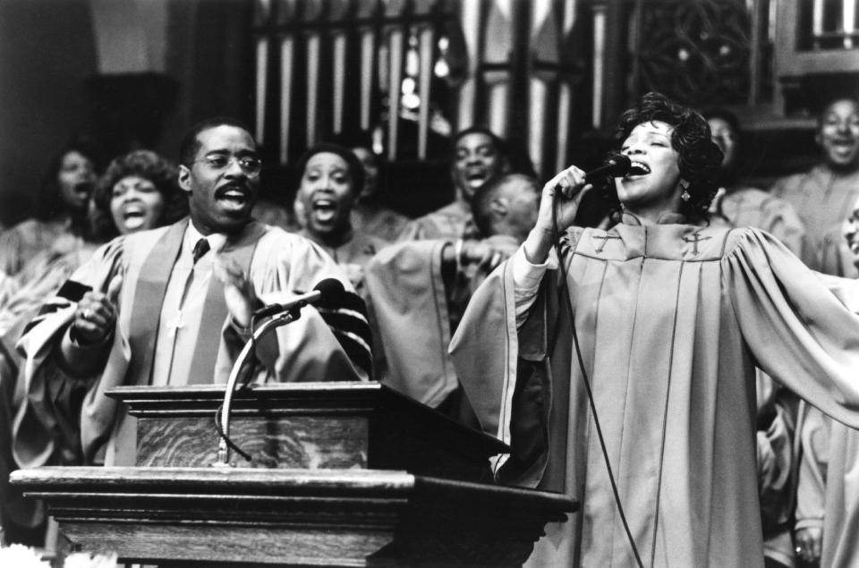 Whitney Houston, right, and Courtney B. Vance in the 1996 film "The Preacher's Wife."