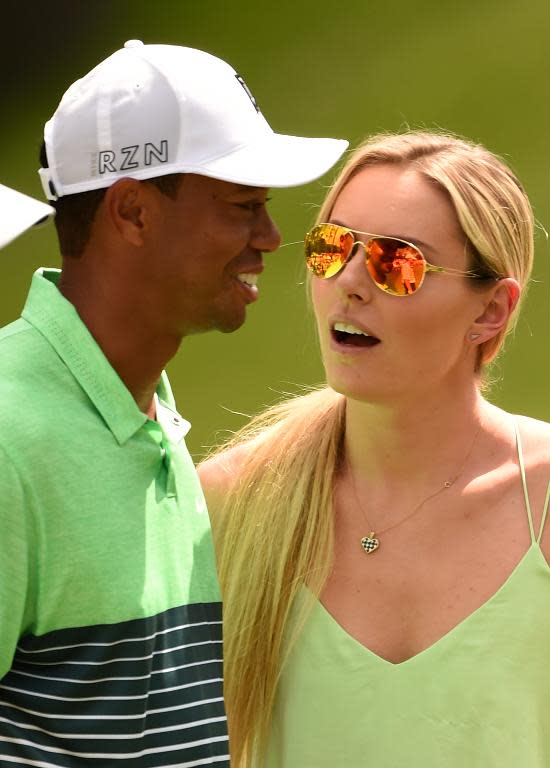 Golfer Tiger Woods and skier Lindsey Vonn during the Par 3 competition Augusta National Golf Club in Augusta, Georgia on April 8, 2015