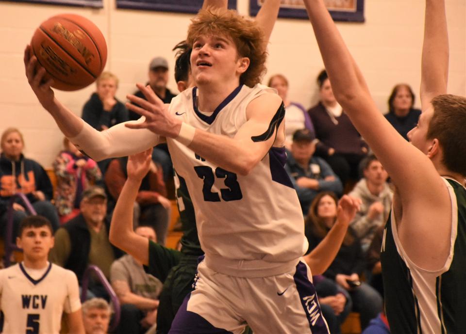 Camerohn Ludwig shoots for the 1,000th point of his varsity career with four seconds remaining in Thursday's game against Hamilton. Ludwig capped a 30-point performance by scoring the game's final basket.