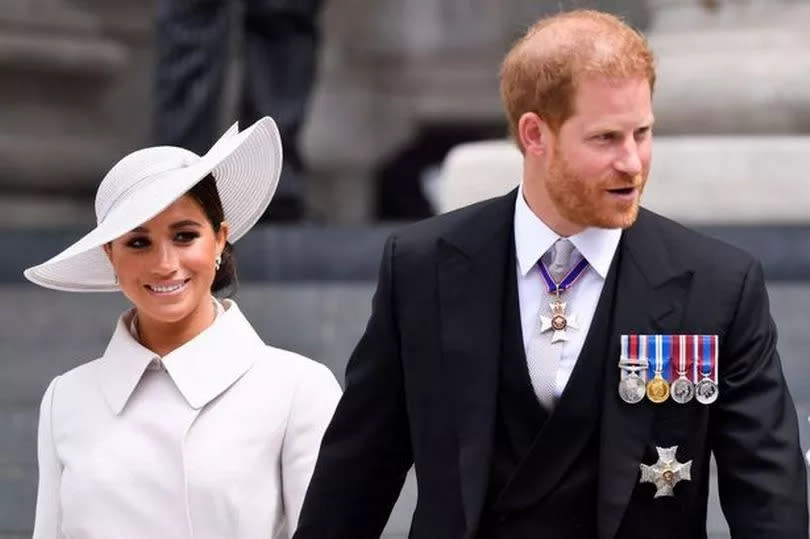 Meghan Markle and Prince Harry walking together