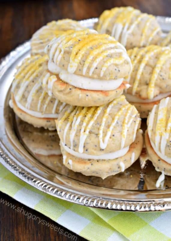 <p>Shugary Sweets</p><p><strong>Get the recipe: <a href="https://www.shugarysweets.com/lemon-poppy-seed-whoopie-pies/" rel="nofollow noopener" target="_blank" data-ylk="slk:Lemon Poppy Seed Whoopie Pies;elm:context_link;itc:0;sec:content-canvas" class="link rapid-noclick-resp">Lemon Poppy Seed Whoopie Pies</a></strong></p>