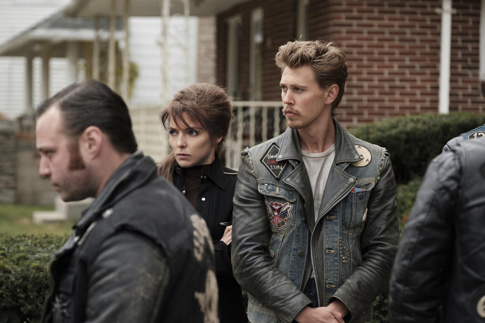 This image released by Focus Features shows Emory Cohen, from left, Jodie Comer and Austin Butler in a scene from "The Bikeriders." (Focus Features via AP)