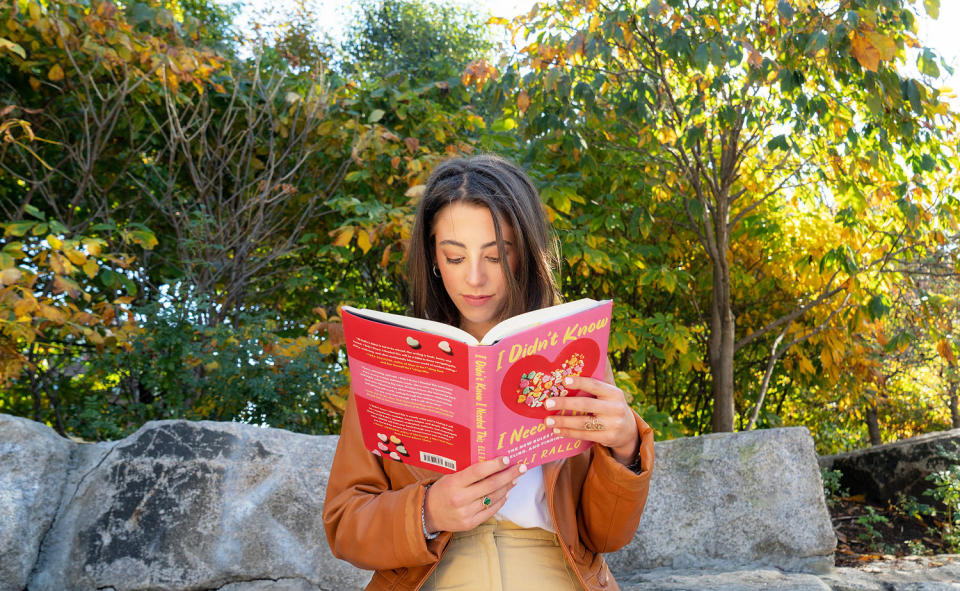 Eli Rallo with her book 