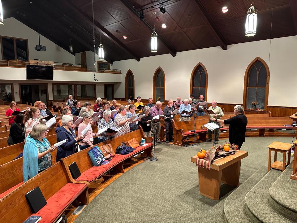 Cantate Singers rehearse for the concert at 7 p.m. Nov. 18 at First Presbyterian Church in Wooster.