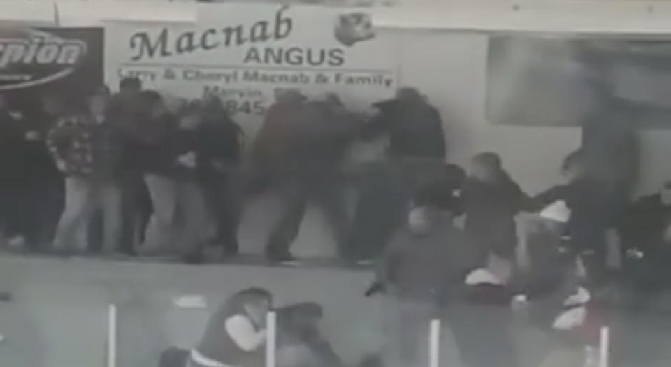 A massive crowd fight breaks out during the provincial D senior hockey finals in Turtleford, Saskatchewan.