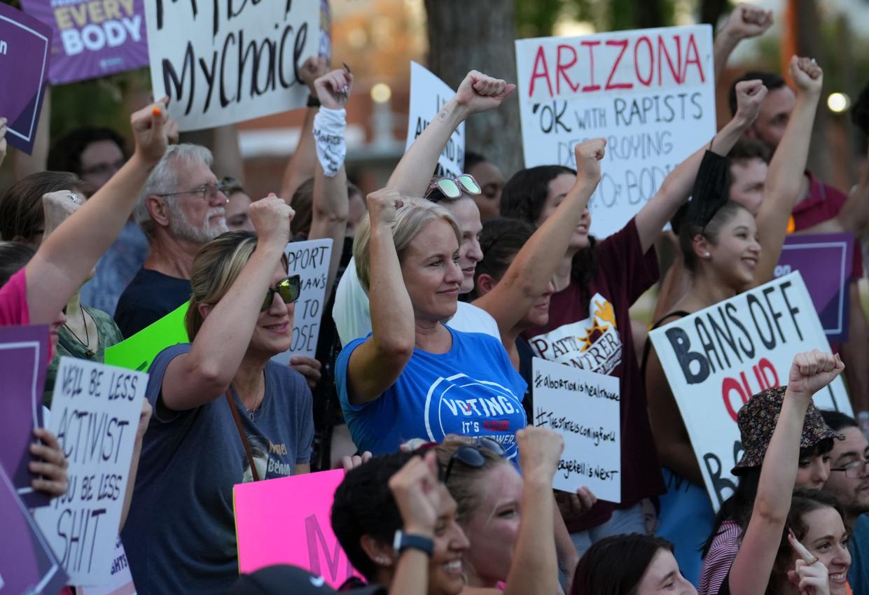 Abortion rights demonstrators gather at the Arizona Capitol in Phoenix on Sept. 24, 2022, to voice concerns with the recent ruling by a Pima County judge that reinstated an over century-year-old ban on abortion in almost all cases.