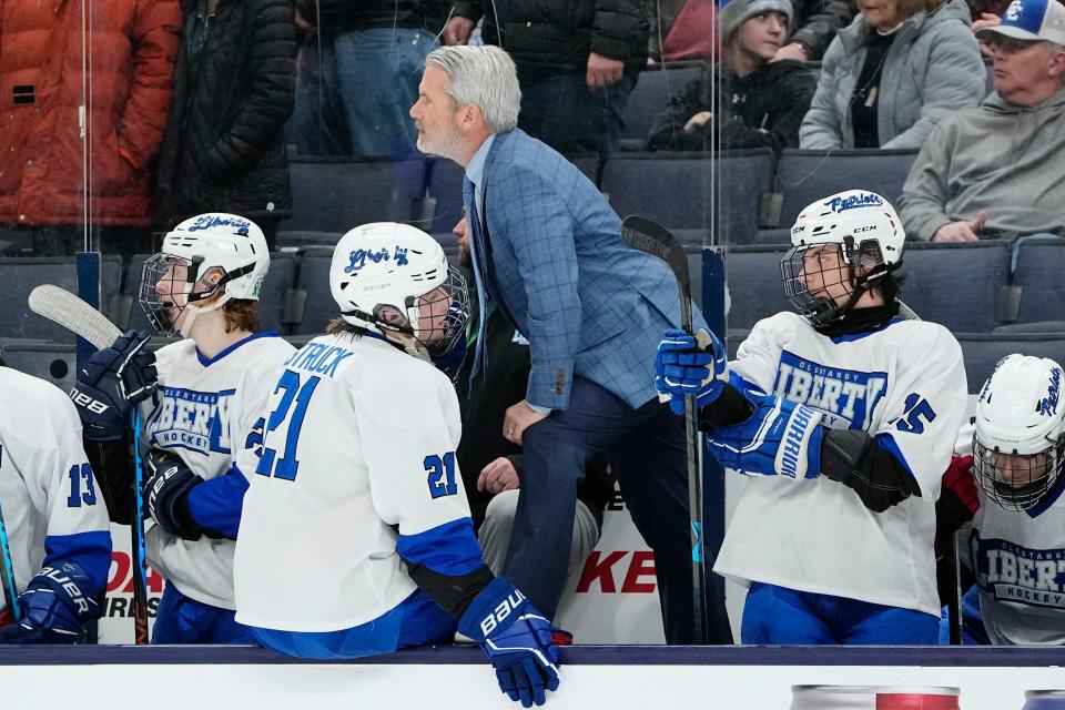 Olentangy Liberty hockey coach Kevin Alexander, here leading his team in a 2023 state semifinal, has been placed on leave by Olentangy Schools.