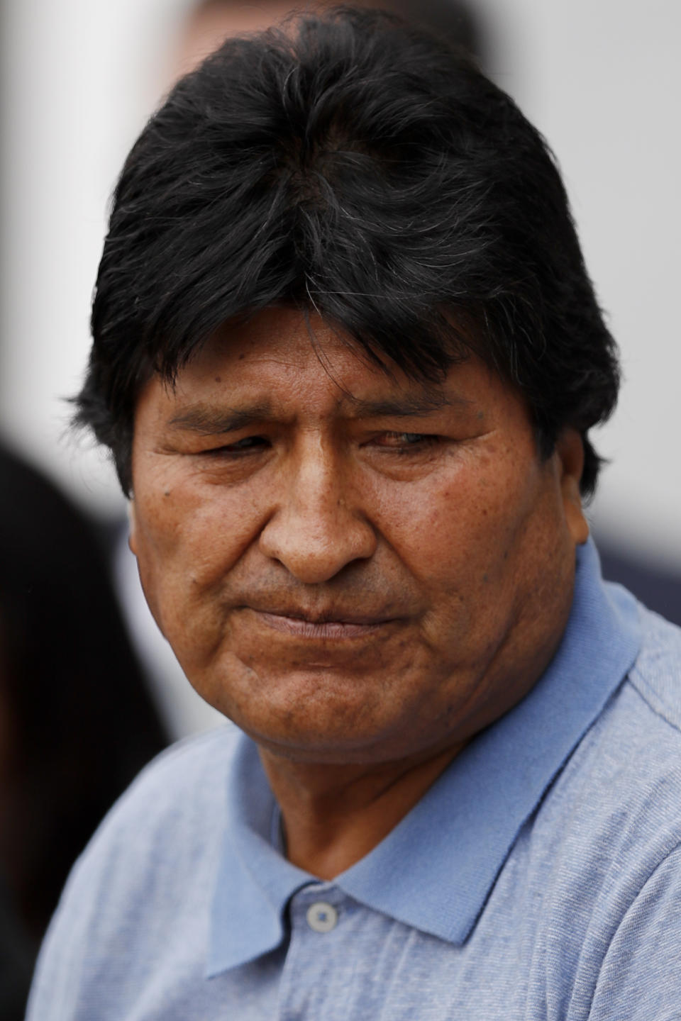 Former Bolivian President Evo Morales pauses as he speaks upon arrival in Mexico City, Tuesday, Nov. 12, 2019. Mexico granted asylum to Morales, who resigned on Nov. 10 under mounting pressure from the military and the public after his re-election victory triggered weeks of fraud allegations and deadly protests. (AP Photo/Eduardo Verdugo)