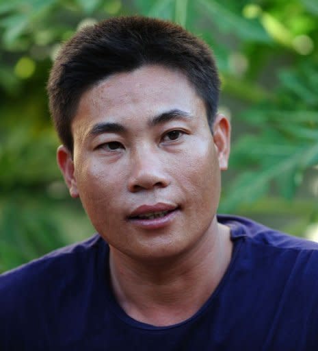 Fisherman Tran Hien talks during an interview with AFP in Ly Son Island off the central province of Quang Ngai in August 2012. When gun-toting Chinese guards spotted Tran Hien's unarmed wooden fishing boat in disputed waters, they seized his vessel, detained his crew and threw him in jail