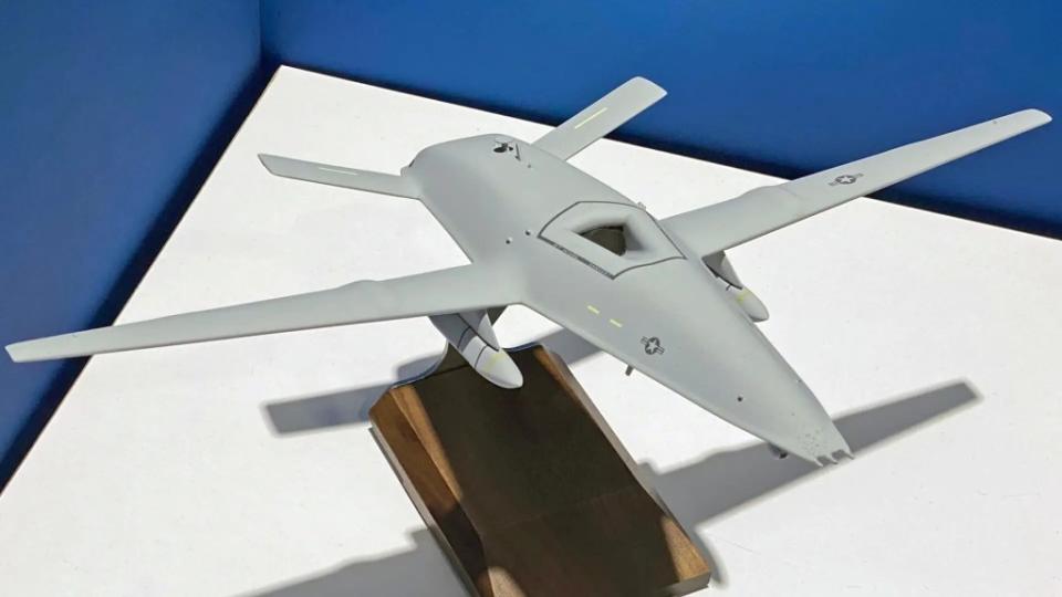 A Boeing model depicting an MQ-25 armed with a pair of stealthy Lockheed Martin AGM-158C Long-Range Anti-Surface Missiles (LRASM). <em>Jamie Hunter</em> A Boeing model depicting an MQ-25 armed with a pair of AGM-158C Long Range Anti-Ship Missiles (LRASM). <em>Jamie Hunter</em>