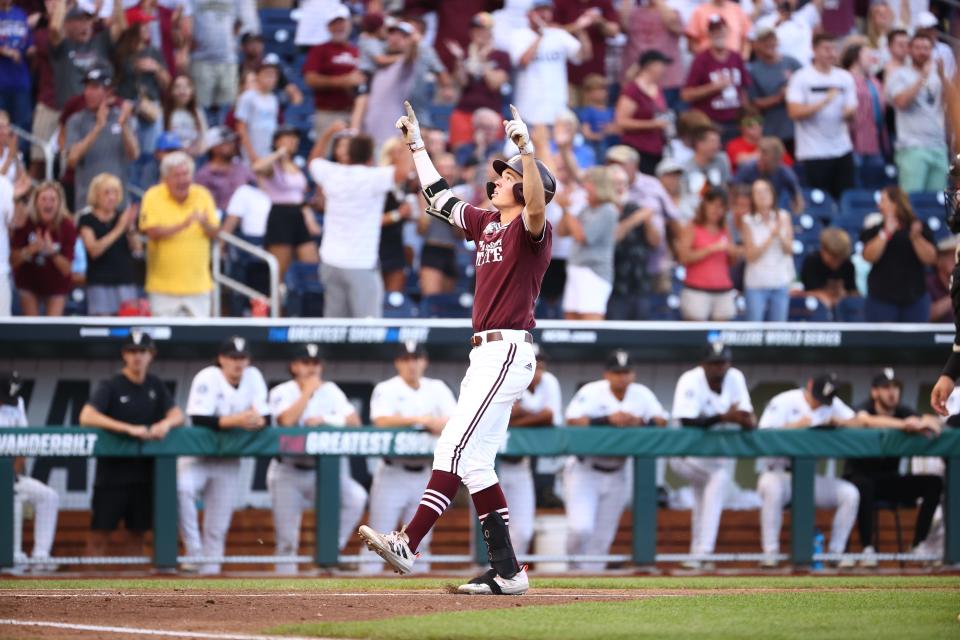 OMAHA, NE - JUNE 30: Kellum Clark #11 of the Mississippi St. Bulldogs celebrates his three-run home run as he crosses home plate against the Vanderbilt Commodores during the seventh inning during the Division I Men's Baseball Championship held at TD Ameritrade Park Omaha on June 30, 2021 in Omaha, Nebraska. (Photo by Justin Tafoya/NCAA Photos via Getty Images)
