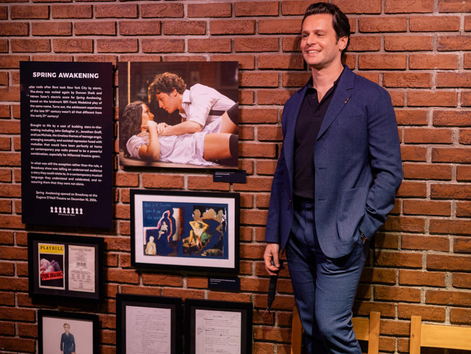 Jonathan Groff enjoys the interactive Spring Awakening exhibit at The Museum of Broadway, alongside original costume designs and notes from the 2006 Broadway production.