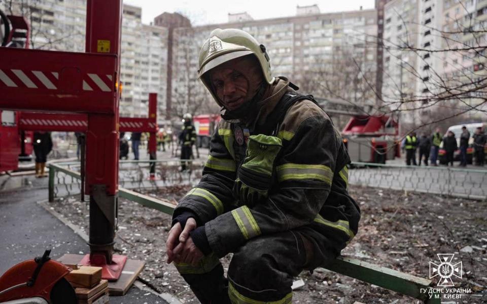 Rescue workers on the ground in Kyiv after this morning's attacks