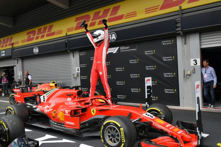 Ferrari's German driver Sebastian Vettel after storming the Belgian Grand Prix