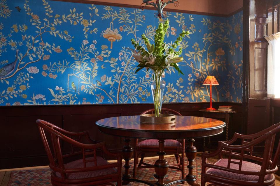 Cosy corners: admire the handpainted de Gournay wallpaper (The Mitre)