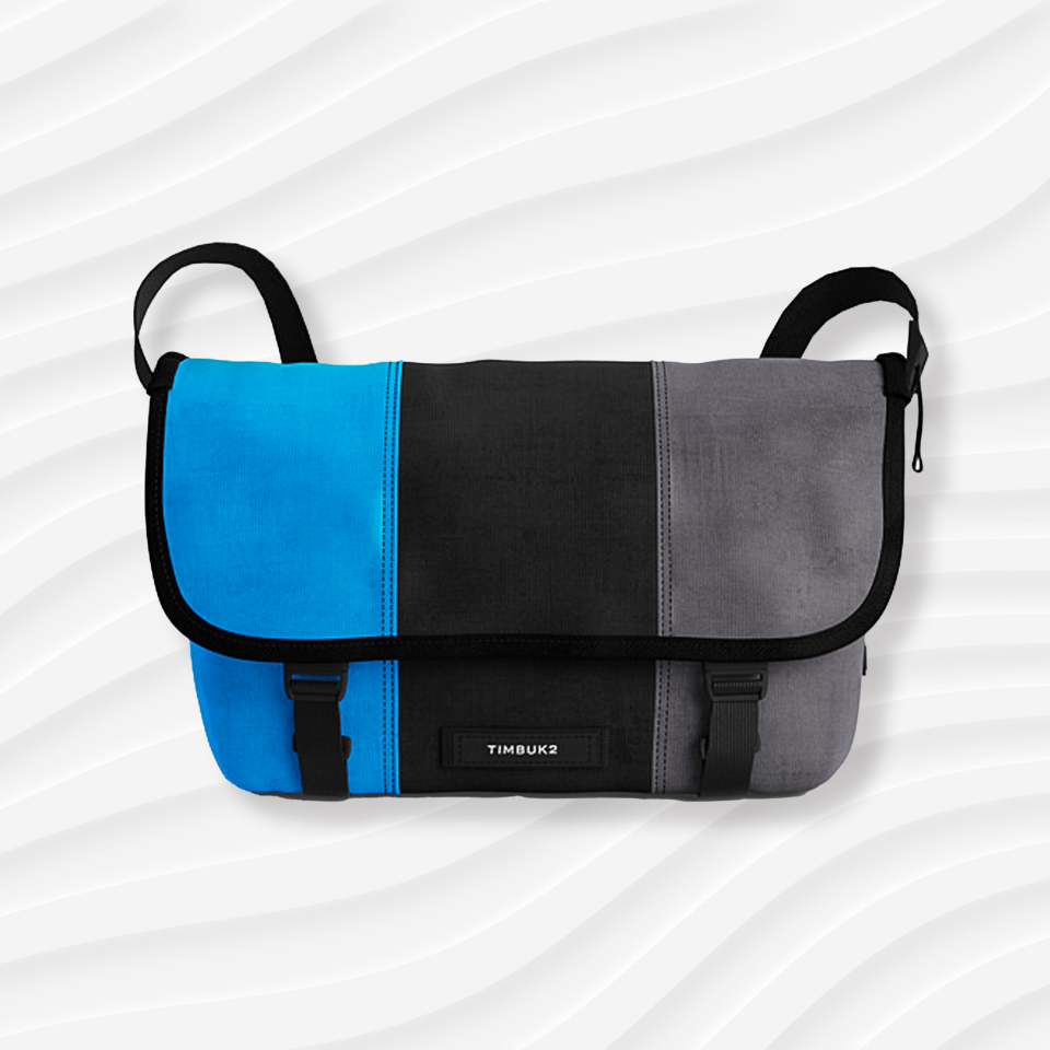 the timbuk2 custom messenger bag seen here with blue, black, and grey detailing