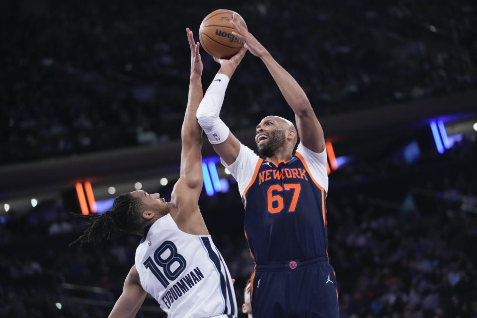 New York Knicks forward Taj Gibson (67) goes to the basket against Memphis Grizzlies forward Tosan Evbuomwan (18) during the first half of an NBA basketball game, Tuesday, Feb. 6, 2024, at Madison Square Garden in New York. (AP Photo/Mary Altaffer)