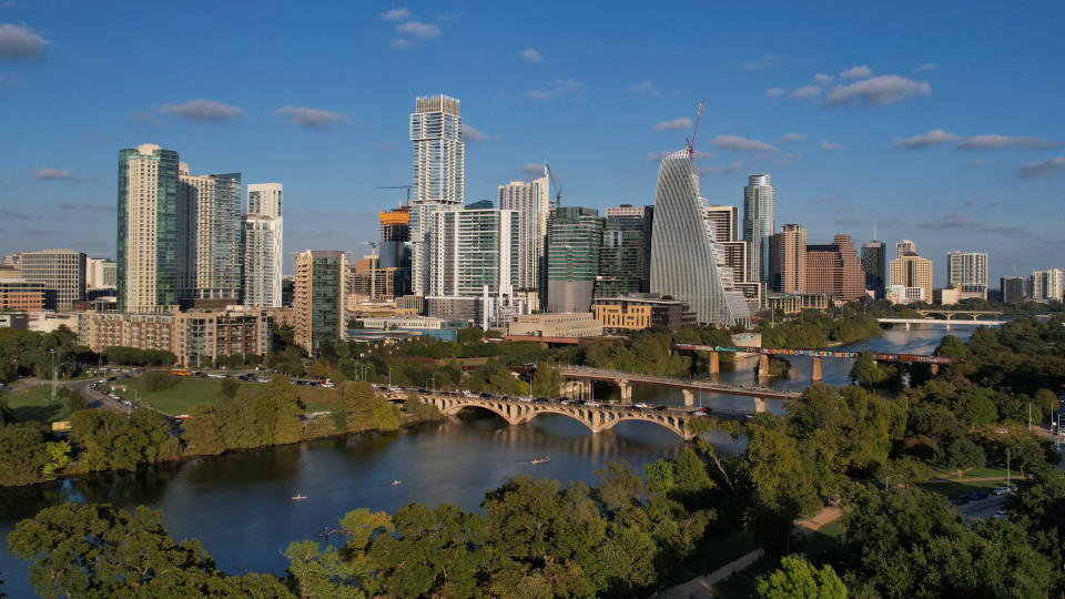 A general view of the city of Austin along the Colorado River in Austin, Texas, October 25, 2021. Picture taken with a drone. REUTERS/Mike Blake