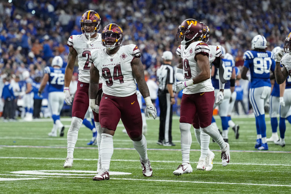 Washington Commanders defensive tackle Daron Payne (94) celebrates a fumble recovery against the Indianapolis Colts in the first half of an NFL football game in Indianapolis, Sunday, Oct. 30, 2022. (AP Photo/AJ Mast)