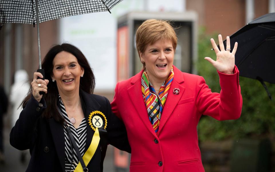 Margaret Ferrier, pictured on the campaign trail with Nicola Sturgeon in Glasgow last year - Jane Barlow/PA