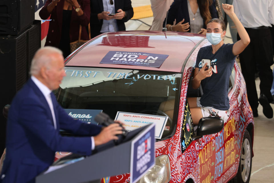 Joe Biden delivers remarks during a drive-in voter mobilisation event in Florida.