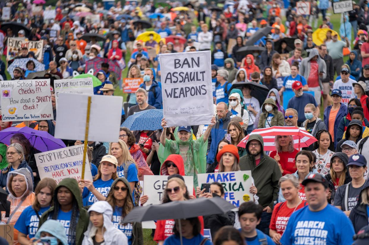 People participate in the second March for Our Lives rally in support of gun control Saturday in Washington. (AP Photo/Gemunu Amarasinghe)