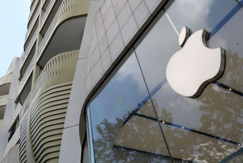 The Apple Inc logo is seen at the entrance to the Apple store in Brussels