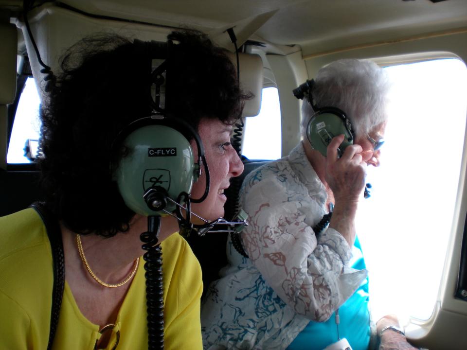 The author's sister Diane with their mom, Rho Rho, in a helicopter in Toronto for Diane's 60th birthday.