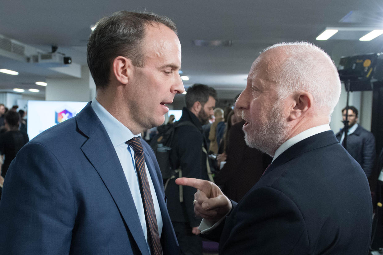 Foreign Secretary Dominic Raab (left) and shadow transport secretary Andy McDonald exchange views at the Octagon in Sheffield, South Yorkshire, after leaders of four major parties took part in the BBC Question Time Leaders' Special. (Photo by Stefan Rousseau/PA Images via Getty Images)