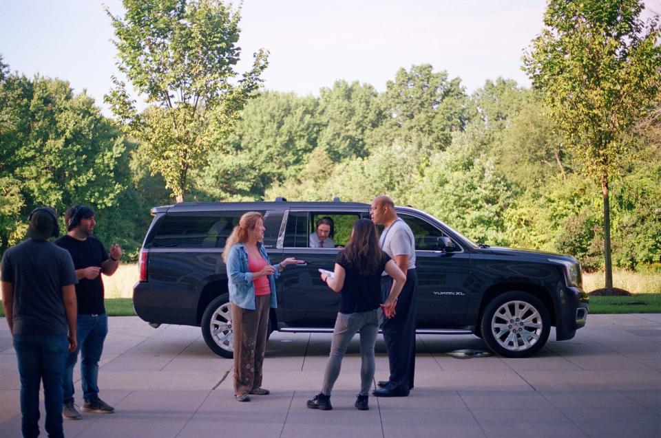 "Relative Control" director Dafna Yachin speaks to members of the cast before shooting a scene of the Delaware-made film.