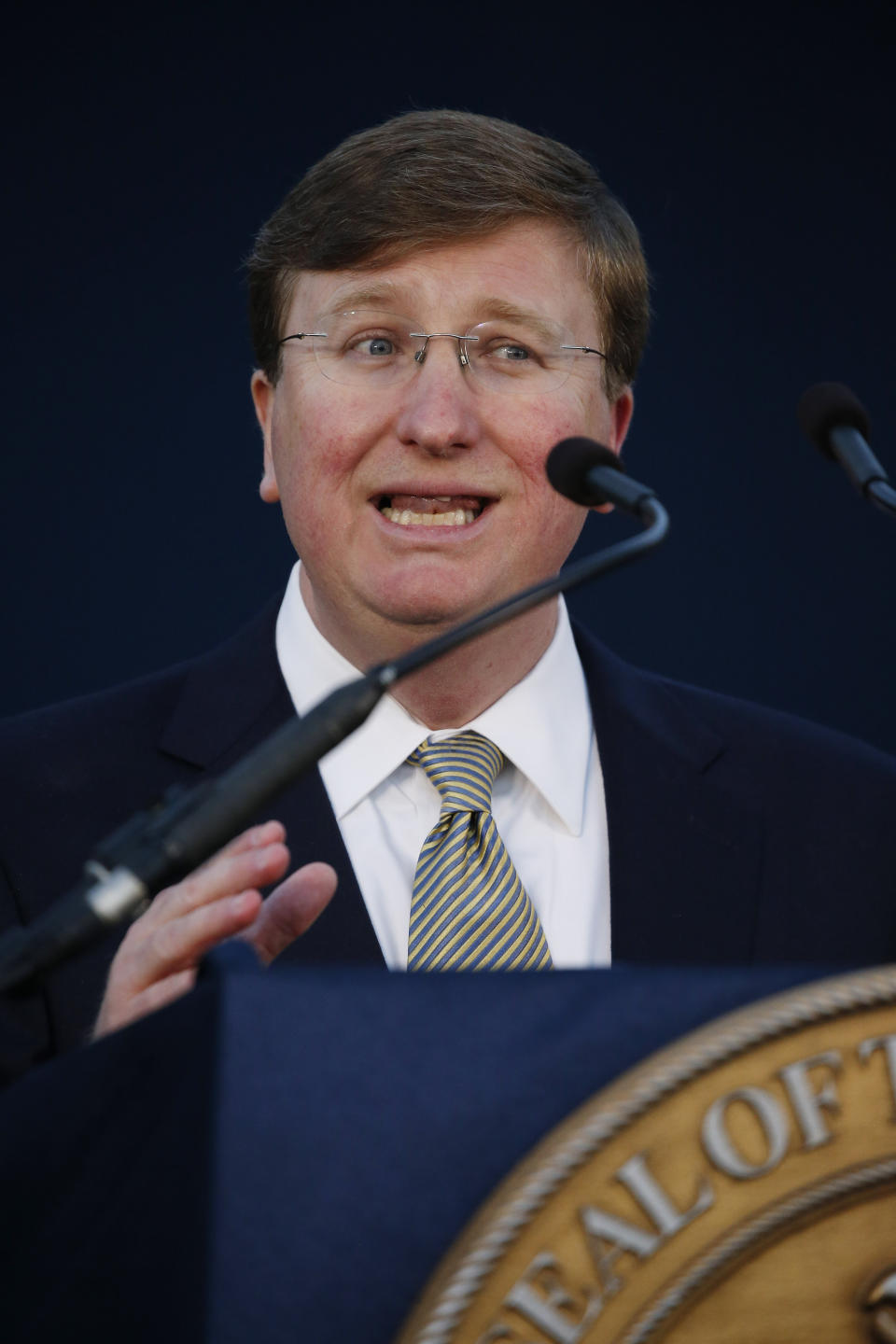 Gov. Tate Reeves addresses a joint session of the Legislature outside the Capitol as he delivers his first State of the State address in Jackson, Miss., Monday, Jan. 27, 2020. (AP Photo/Rogelio V. Solis)