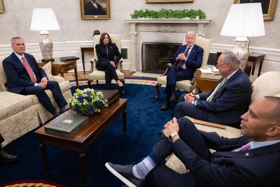 US President Joe Biden (C) speaks during a meeting on the debt limit with (L-R) US House Speaker Kevin McCarthy (R-CA), US Vice President Kamala Harris, Senate Majority Leader Chuck Schumer (D-NY), and House Minority Leader Hakeem Jeffries (D-NY) in the Oval Office of the White House in Washington, DC, on May 16, 2023. (Photo by SAUL LOEB / AFP) (Photo by SAUL LOEB/AFP via Getty Images)