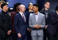 <p>NBA commissioner Adam Silver speaks to Markelle Fultz before the first round of the 2017 NBA Draft at Barclays Center on June 22, 2017 in New York City. </p>
